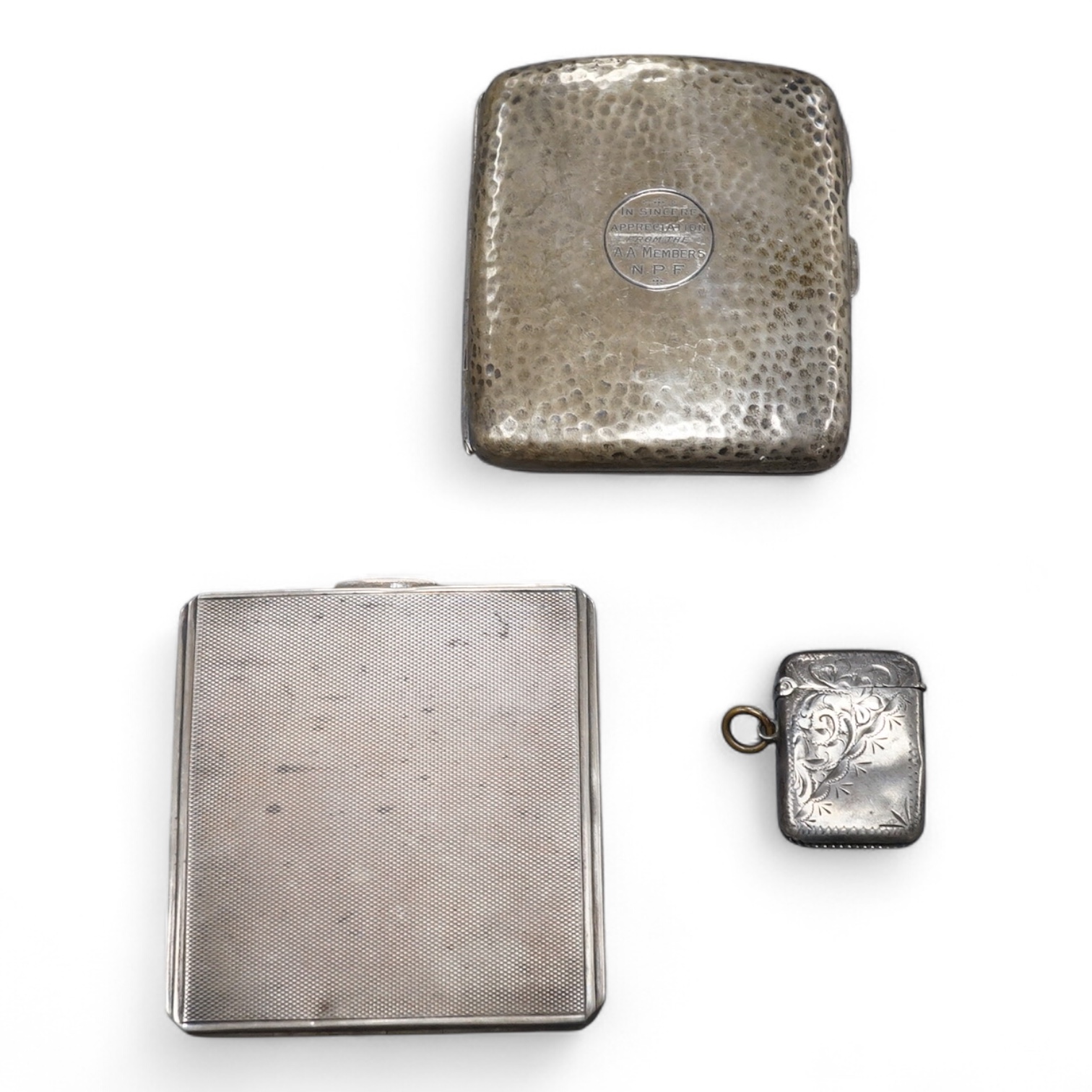 Two silver cigarette cases, including Art Deco, Birmingham, 1942, 87mm and a silver vesta case.